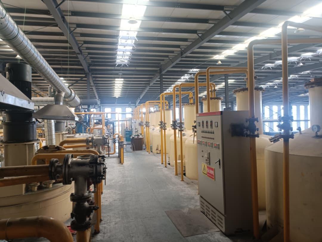 Cruise Grease production floor with blending vessels and process control panels