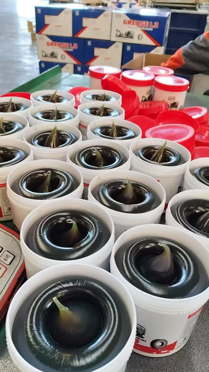 Cruise Grease pails freshly filled with grease ready for the production line